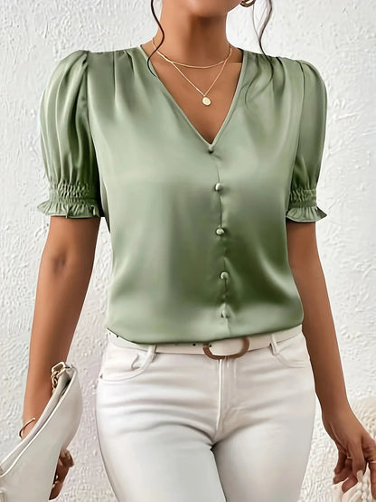 Abella - Elegant bluse med V-hals og pufferm