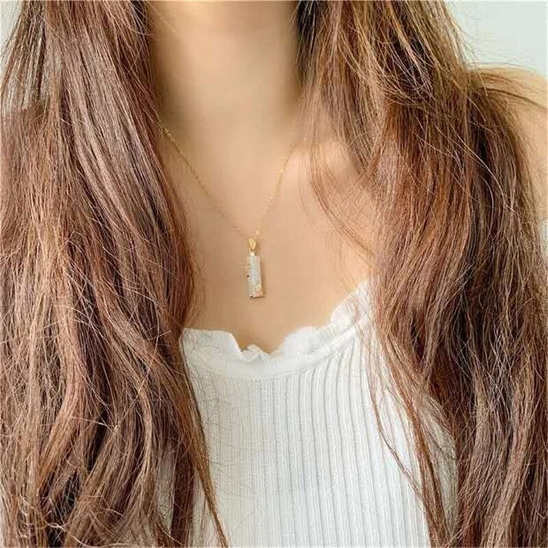 collier amulette i jade