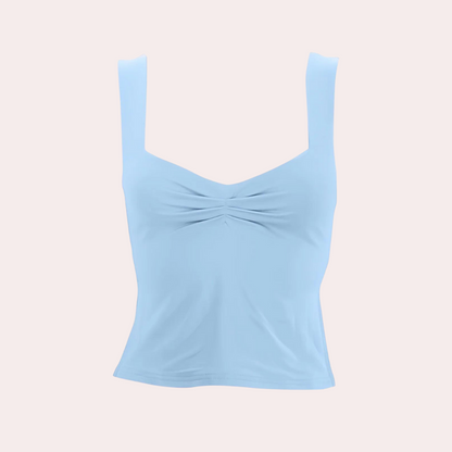 Elegant ermeløs sommerbluse for kvinner