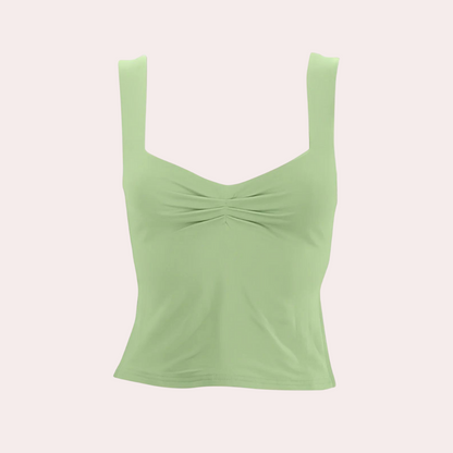 Elegant ermeløs sommerbluse for kvinner