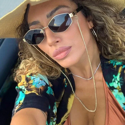 Lyra | Solbriller med statement-kjede