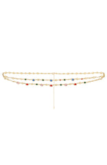 LYRA – Flerlaget body chain i gull