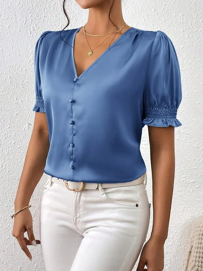 Abella - Elegant bluse med V-hals og pufferm