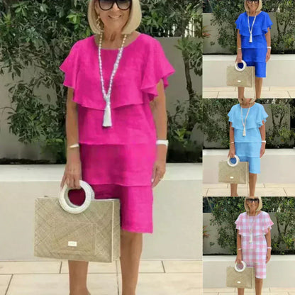 Stela | Grasiøs flytende kjole med volanger