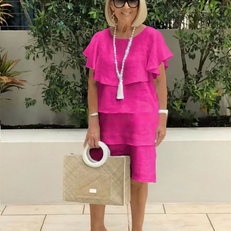 Stela | Grasiøs flytende kjole med volanger